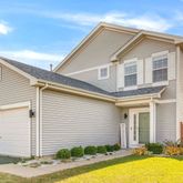 a front view of house with yard