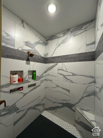 1240 West 2360 North Helper, UT 84526 - Photo 37 of 79 Full bathroom featuring a marble finish shower and a textured ceiling