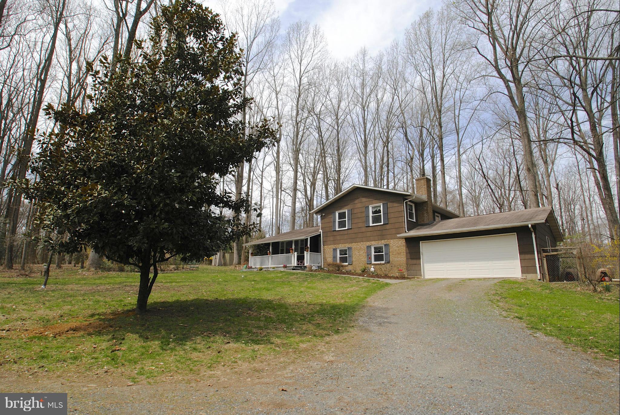 985 Chesterfield Road Annapolis, MD 21401 - Photo 1 of 30 a front view of a house with a yard