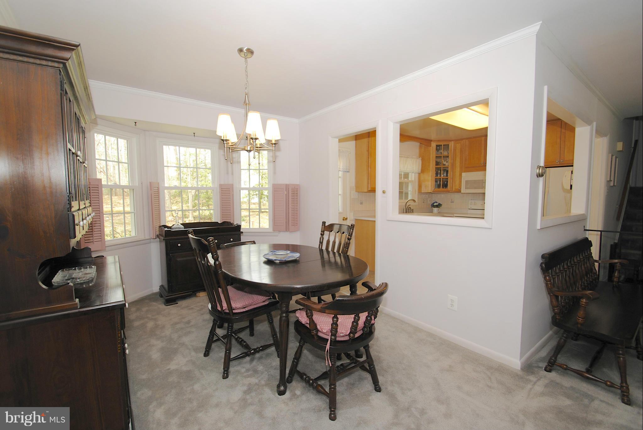 985 Chesterfield Road Annapolis, MD 21401 - Photo 13 of 30 a view of a a dining room with furniture window and outside view