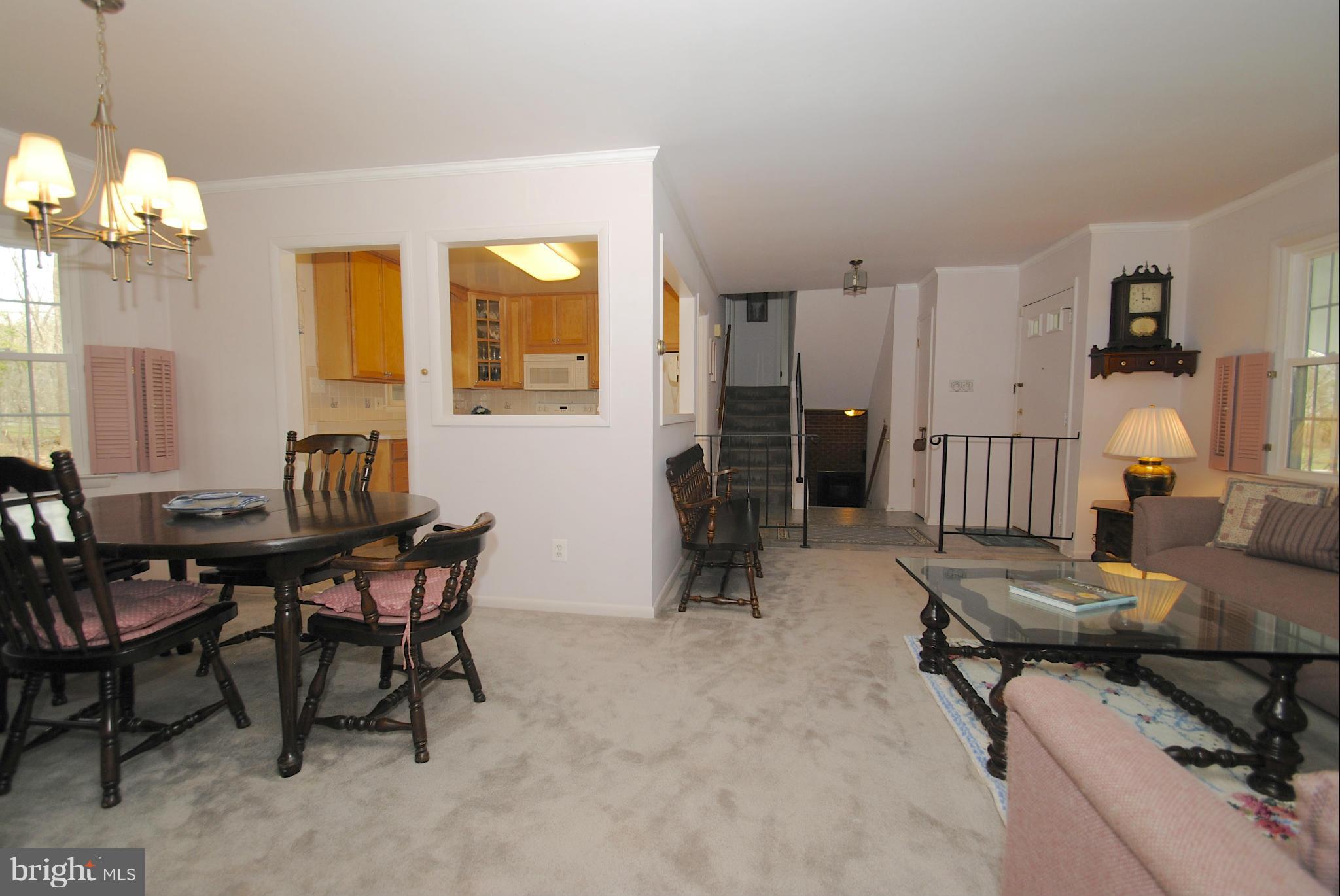 985 Chesterfield Road Annapolis, MD 21401 - Photo 15 of 30 a workspace with furniture and a chandelier