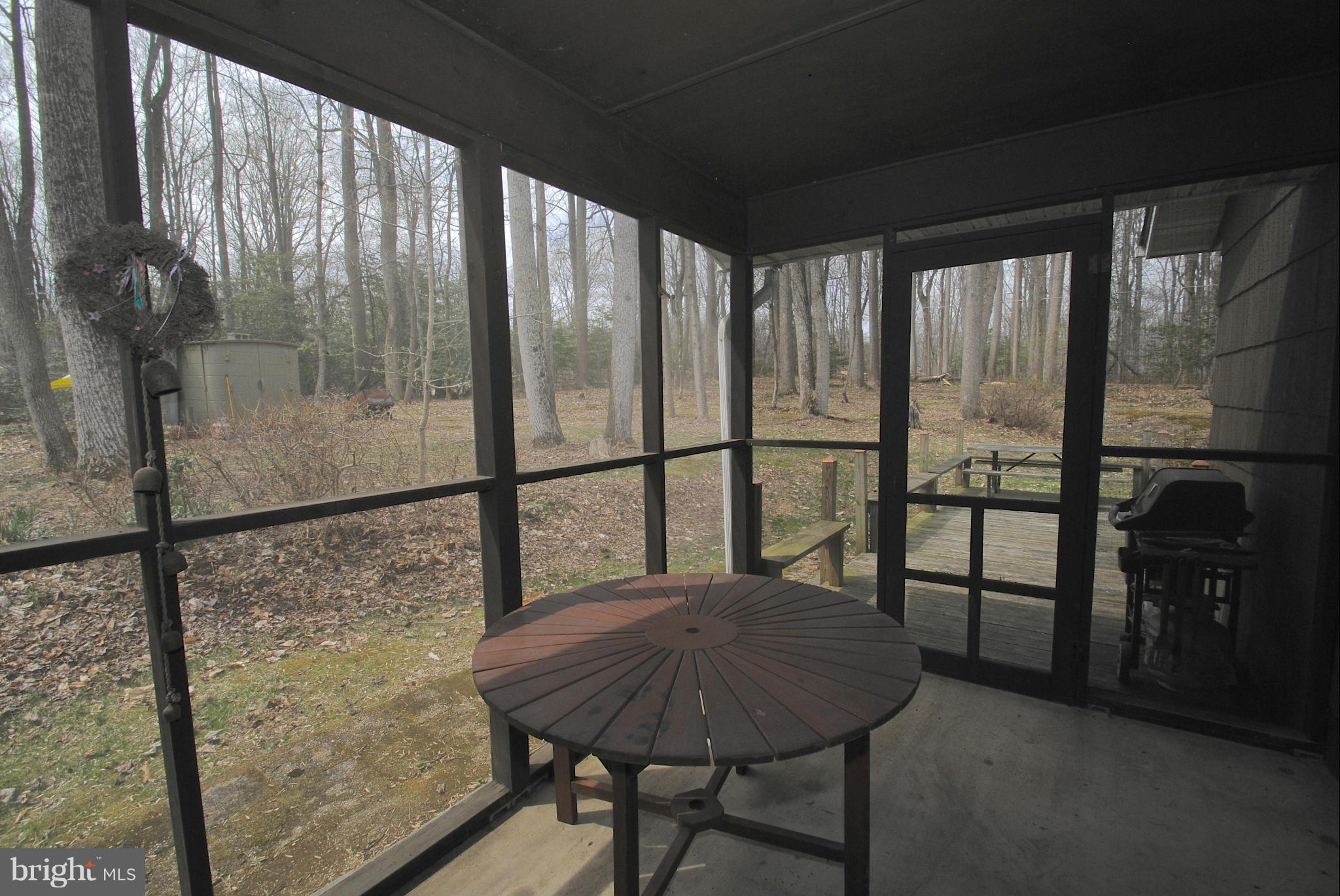 985 Chesterfield Road Annapolis, MD 21401 - Photo 18 of 30 a view of a glass door and chair in the balcony