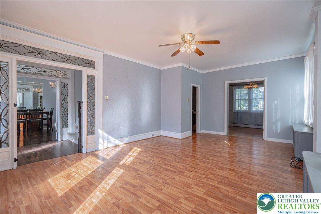 451 East Broad Street Tamaqua, PA 18252 - Photo 13 of 66 a view of livingroom with hardwood floor and ceiling fan