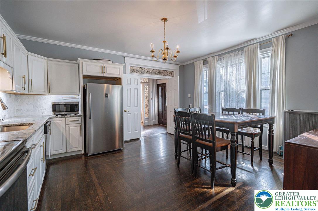 451 East Broad Street Tamaqua, PA 18252 - Photo 20 of 66 a dining room with furniture window and wooden floor