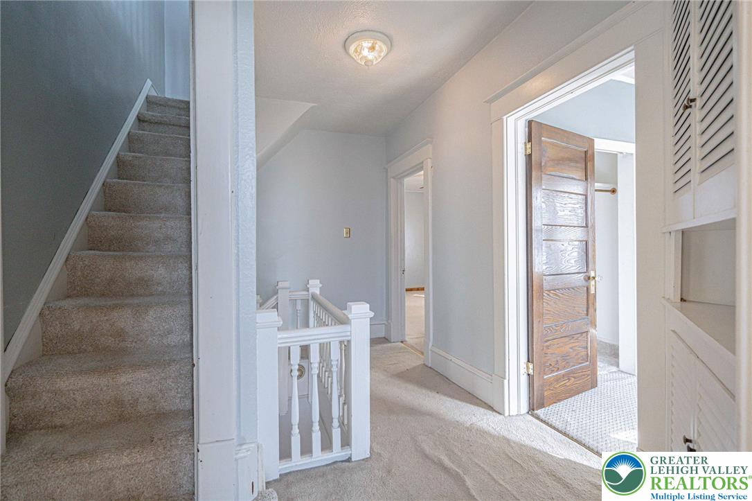 451 East Broad Street Tamaqua, PA 18252 - Photo 28 of 66 a view of a hallway with staircase