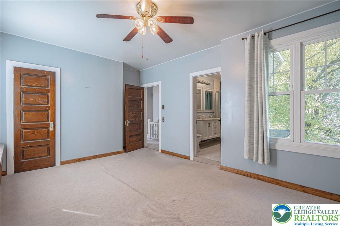 451 East Broad Street Tamaqua, PA 18252 - Photo 31 of 66 an empty room with windows and closet