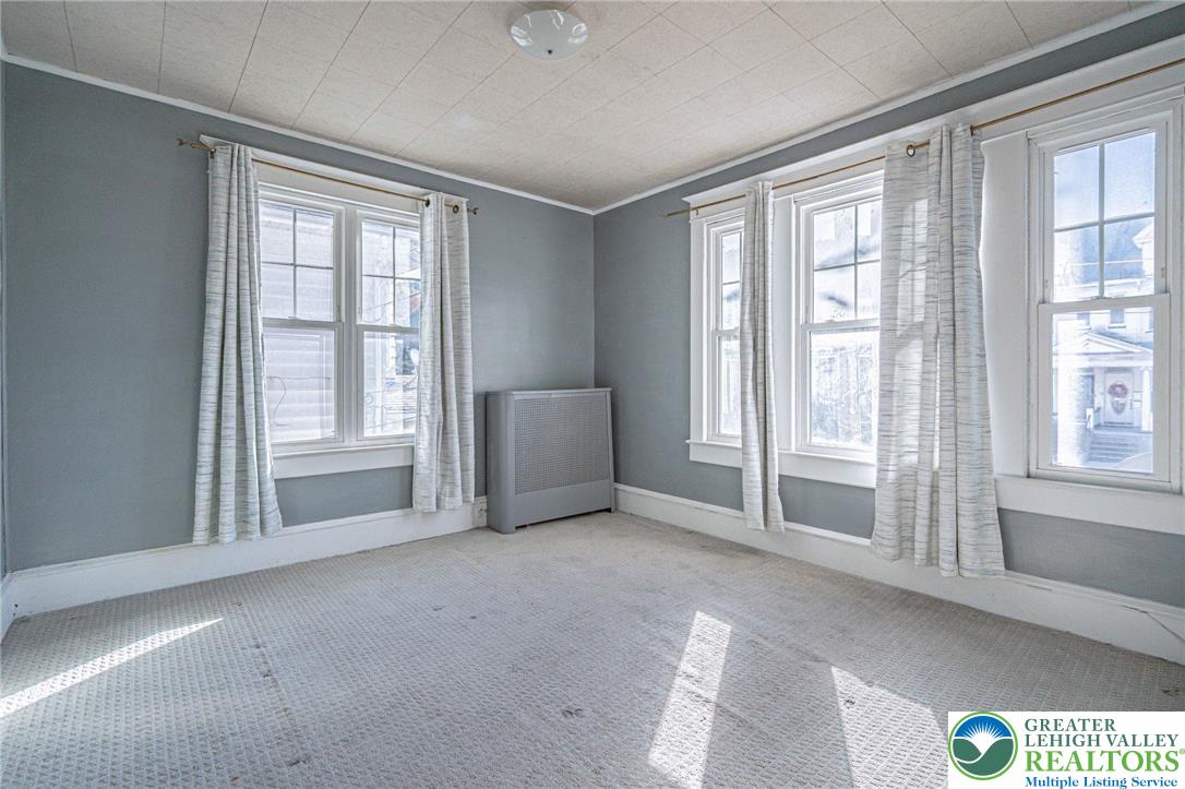 451 East Broad Street Tamaqua, PA 18252 - Photo 33 of 66 an empty room with windows