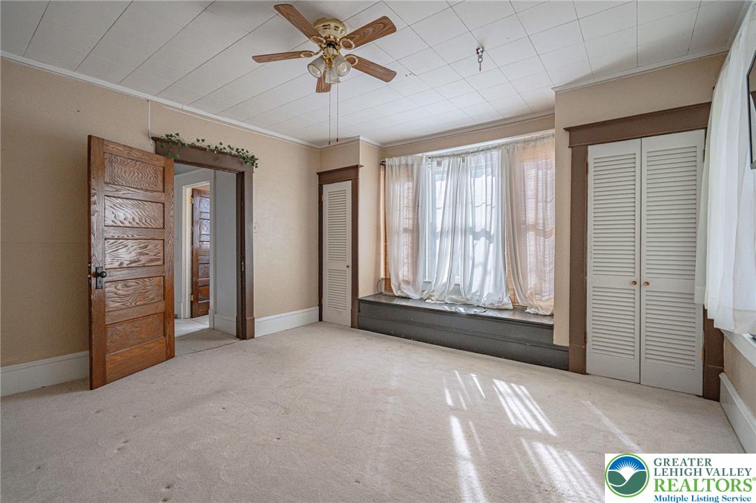 451 East Broad Street Tamaqua, PA 18252 - Photo 38 of 66 a view of an empty room with a window