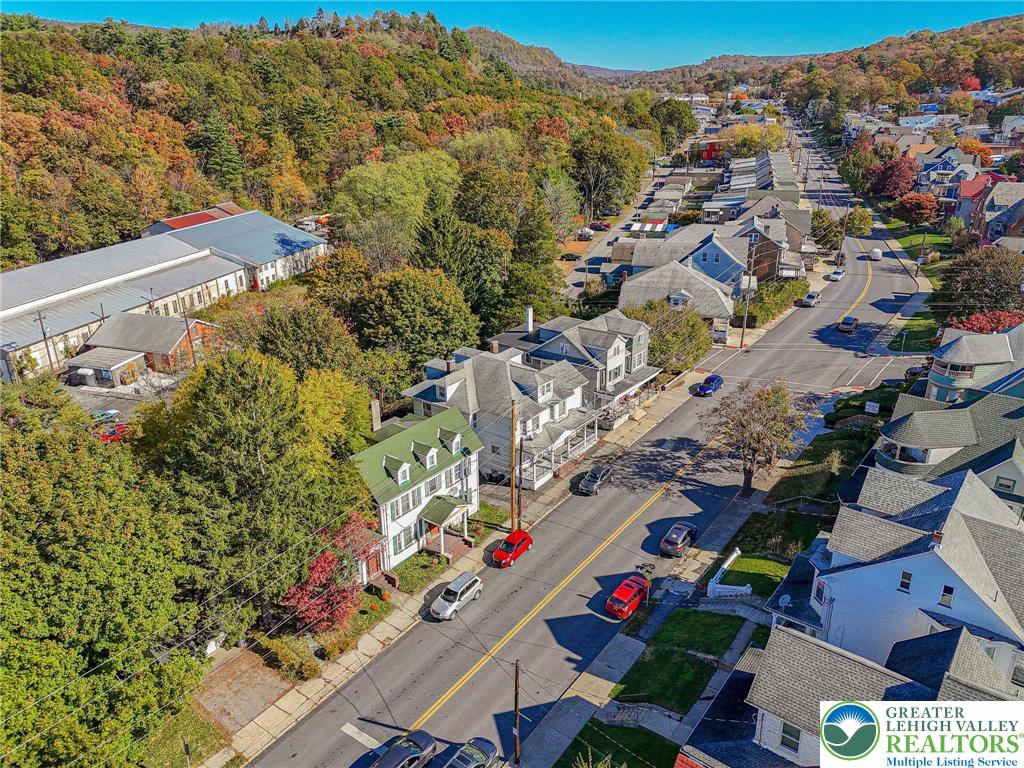 451 East Broad Street Tamaqua, PA 18252 - Photo 4 of 66 an aerial view of residential houses with outdoor space
