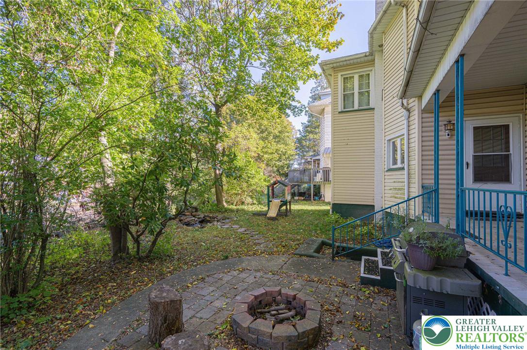 451 East Broad Street Tamaqua, PA 18252 - Photo 59 of 66 a backyard of a house with outdoor seating