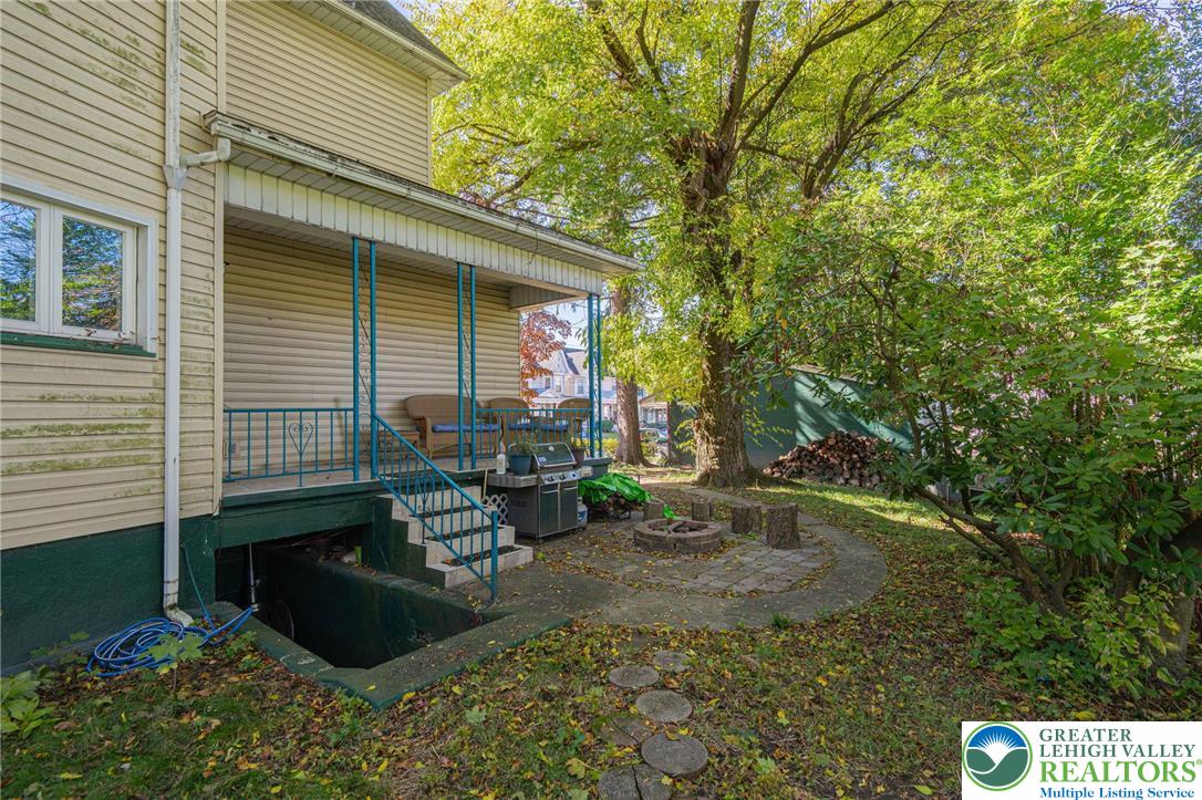 451 East Broad Street Tamaqua, PA 18252 - Photo 60 of 66 a view of a backyard with sitting area and garden