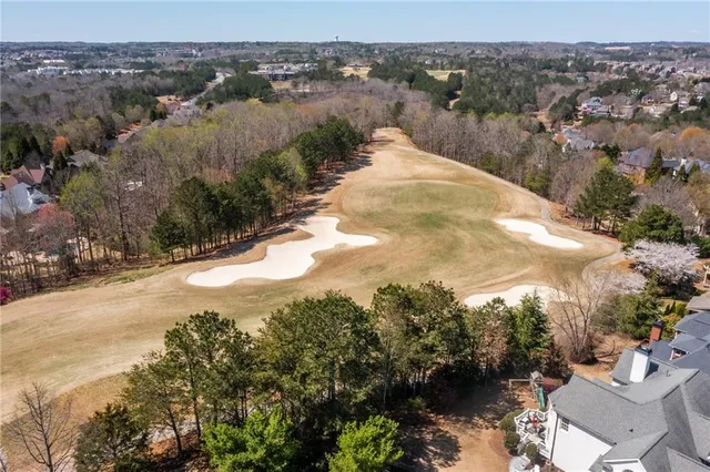 a view of a lake with a city