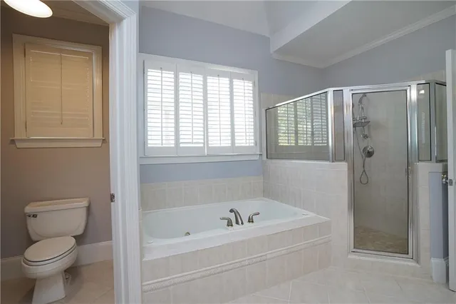 a view of a livingroom with a ceiling fan and window
