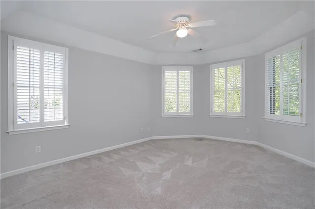 an aerial view of a house with yard