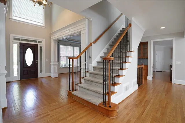 a view of a hallway with staircase