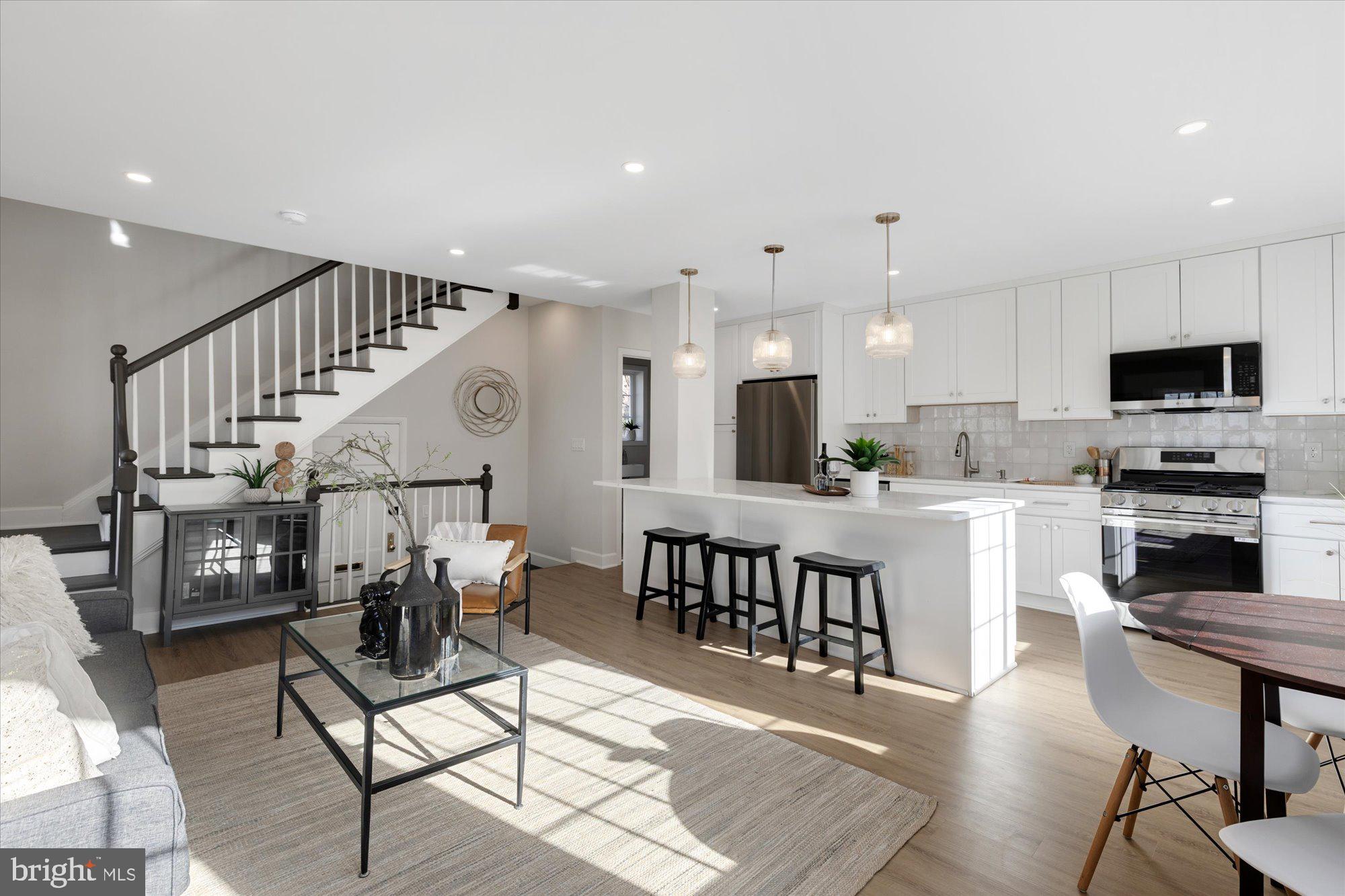 3254 Gunston Road Alexandria, VA 22302 - Photo 2 of 37 Open light-filled living room and kitchen on main