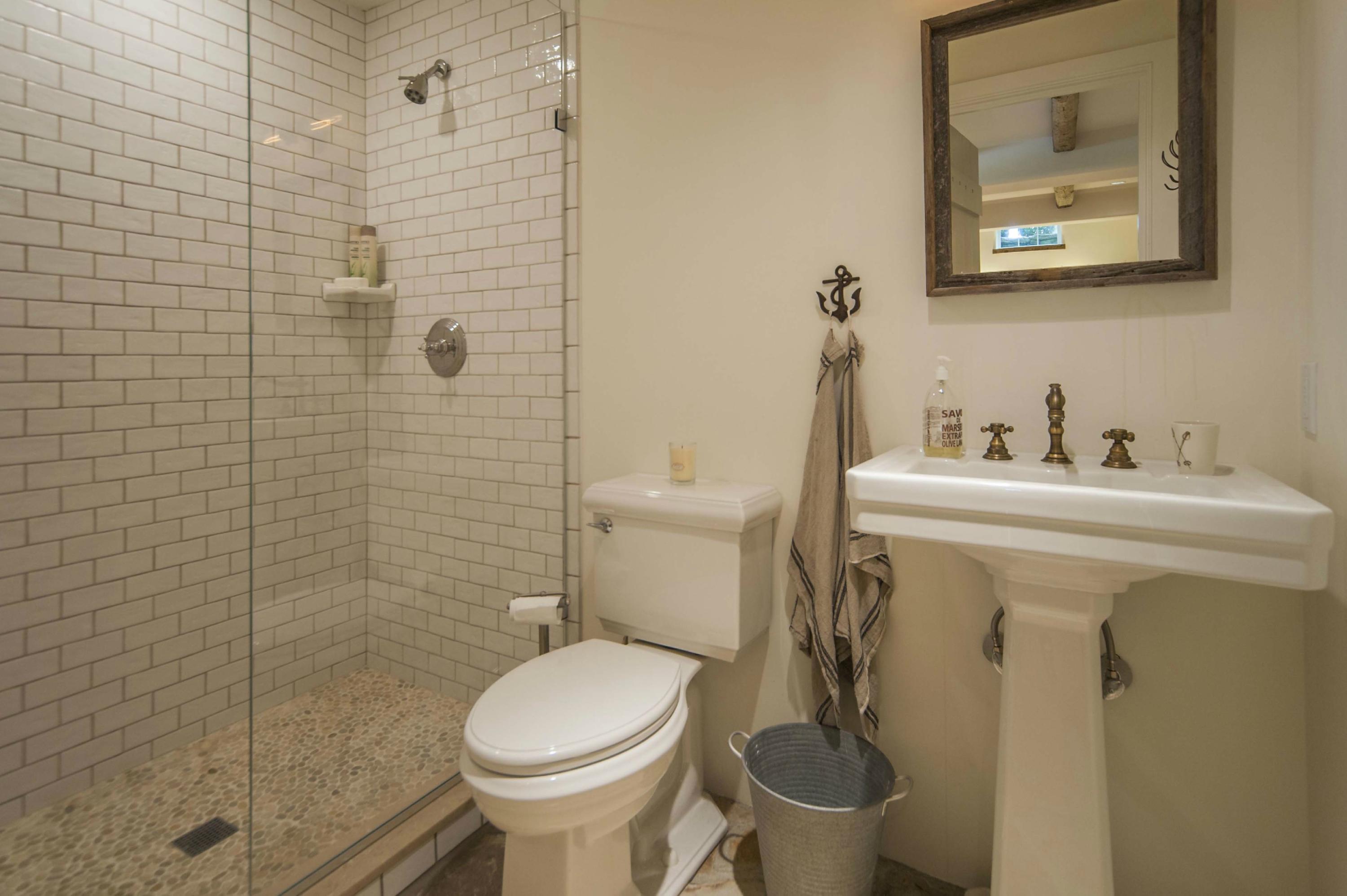 18 Fairmead Road Darien, CT 06820 - Photo 22 of 26 a bathroom with a sink toilet and shower