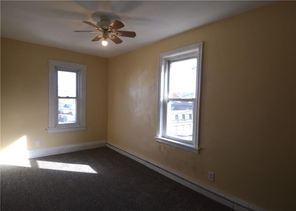340 Prestley Road Bridgeville, PA 15017 - Photo 18 of 23 a view of an empty room with a window