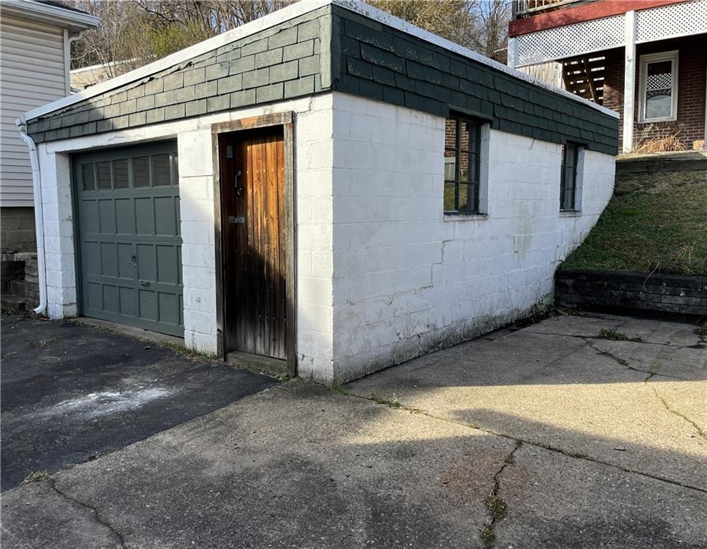 340 Prestley Road Bridgeville, PA 15017 - Photo 23 of 23 a view of a house with a wooden bench
