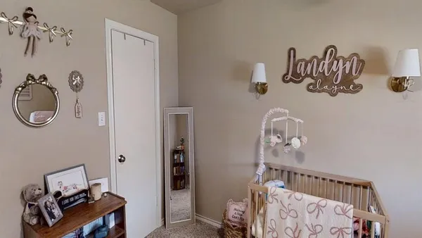 a view of room with workspace and a window