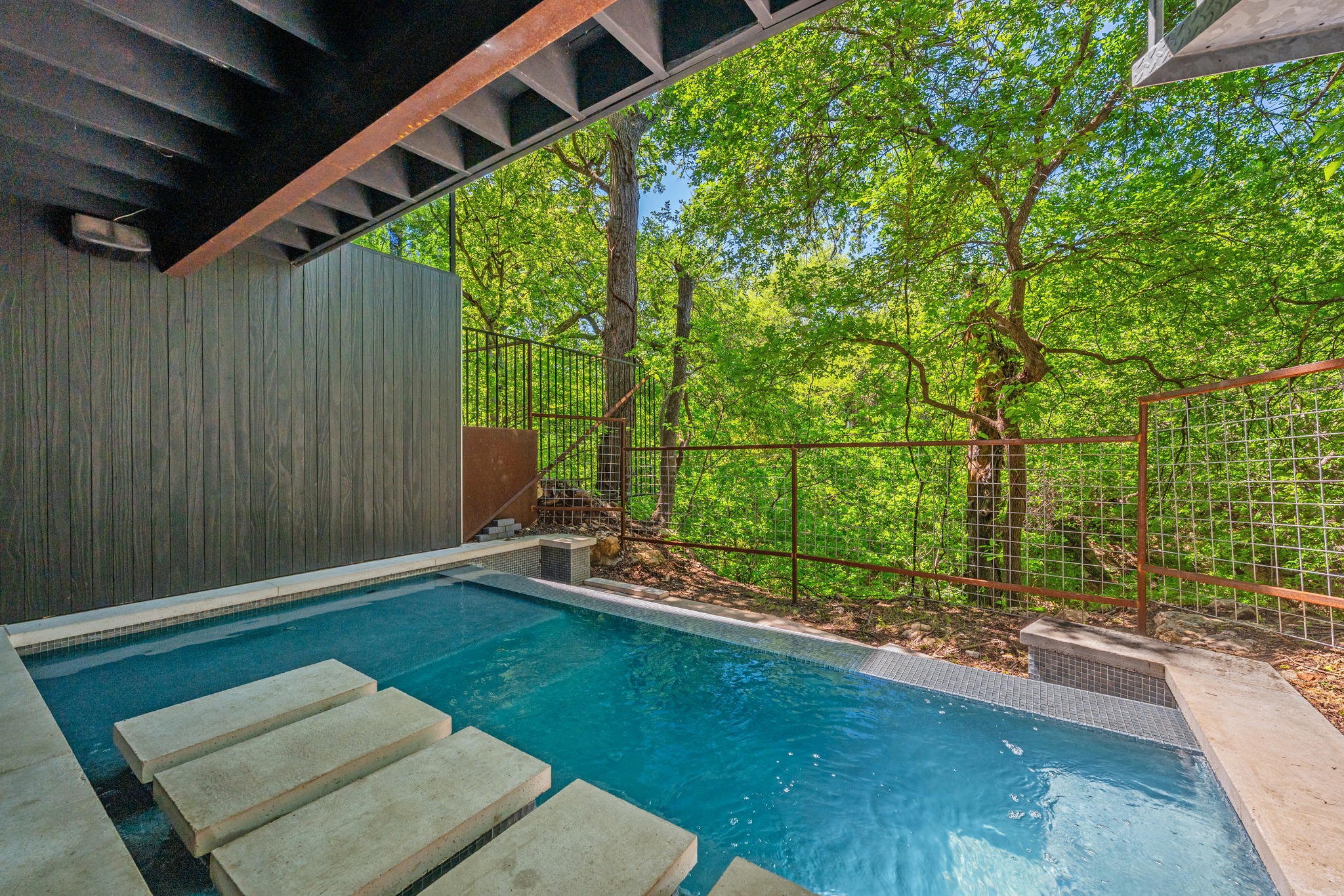 700 Jessie Street Austin, TX 78704 - Photo 35 of 40 View of pool featuring patio surround and stairs