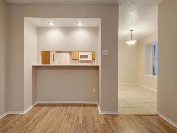a view of a livingroom with wooden floor