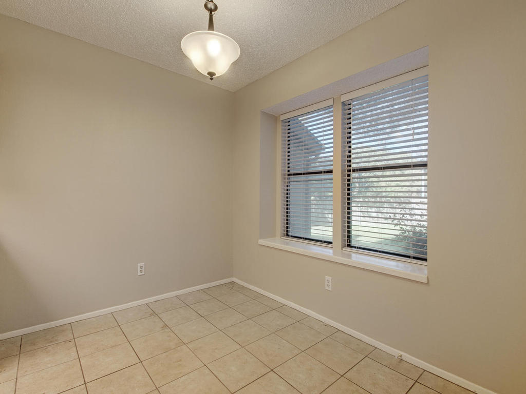 11301 Jollyville Road, Unit A3 Austin, TX 78759 - Photo 10 of 26 a view of an empty room with a window