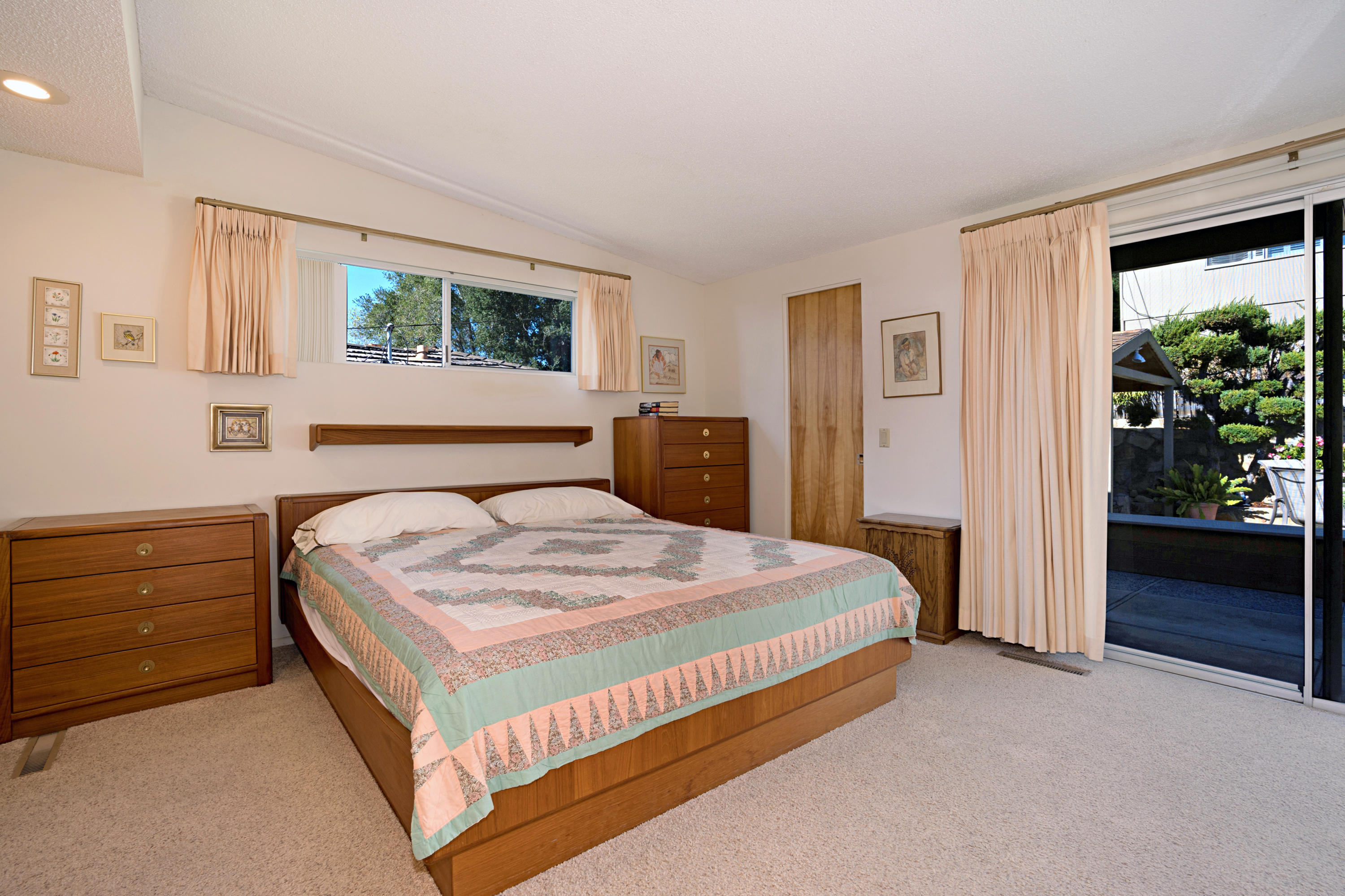 817 Arguello Road Santa Barbara, CA 93103 - Photo 20 of 42 a bedroom with a bed and a window