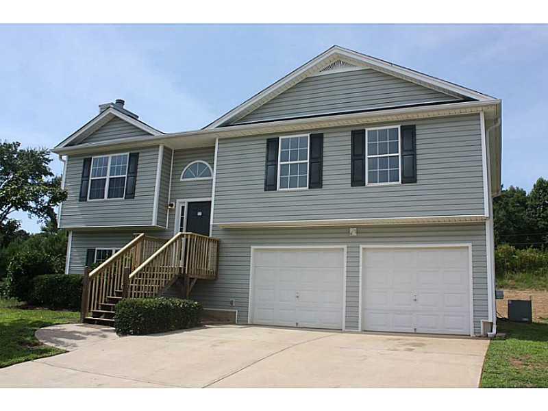123 Rockefeller Lane Dallas, GA 30157 - Photo 1 of 1 Exterior Front. Attractive front elevation with new front steps