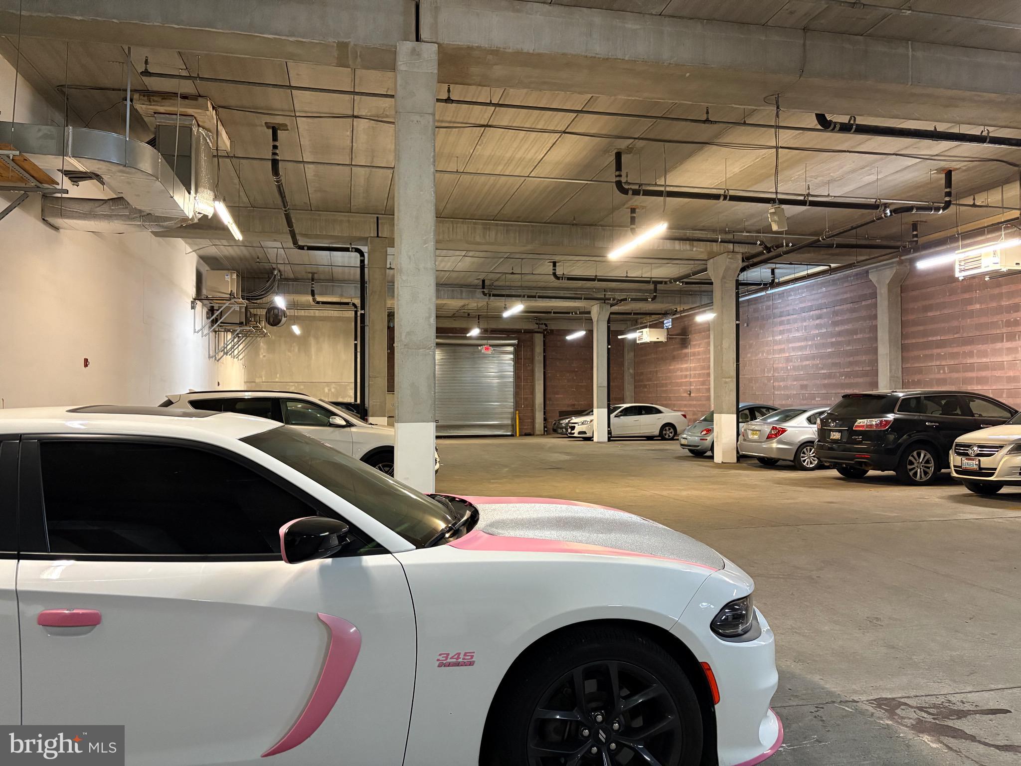 1000 Diamond Street, Unit C Philadelphia, PA 19122 - Photo 18 of 26 a view of parking garage with cars parked