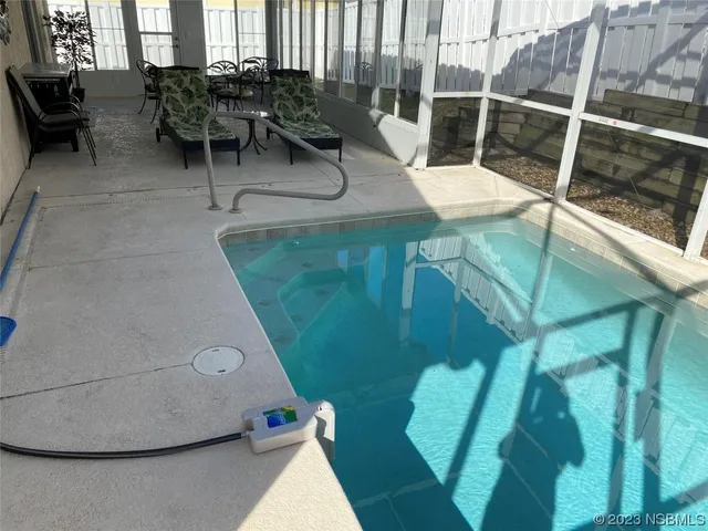a living room with a couch and a table