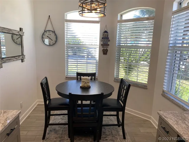 a kitchen with a sink stove and refrigerator