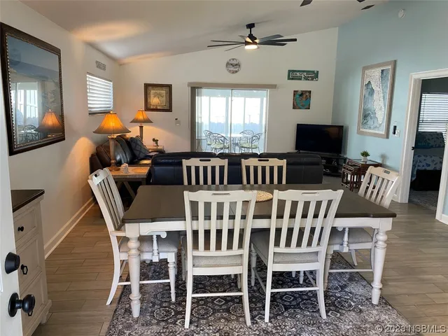 a view of a dining room with furniture