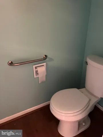 a bathroom with a toilet and a
