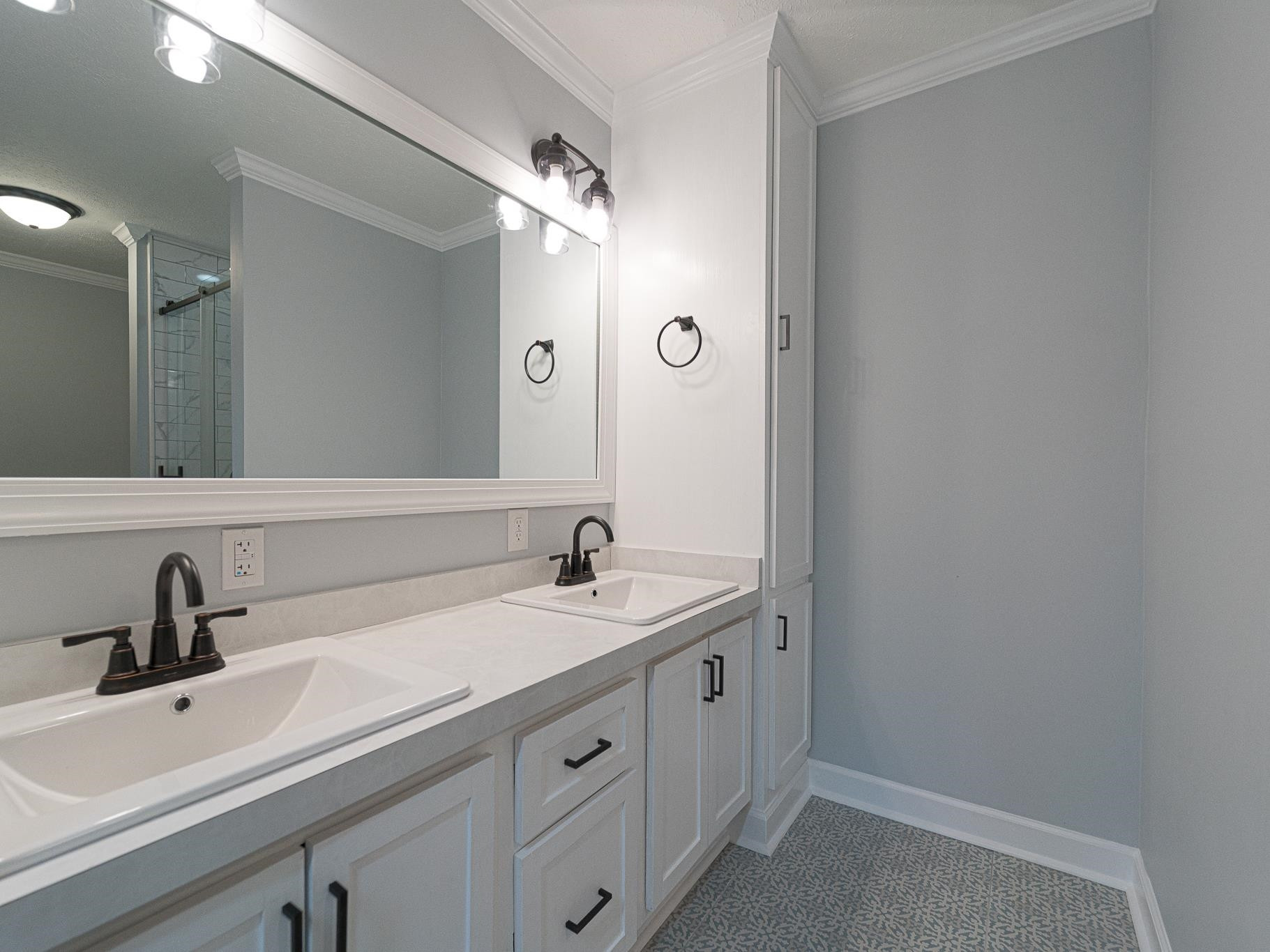 9961 Old Middlesex Road Middlesex, NC 27557 - Photo 18 of 30 a bathroom with a sink and a mirror