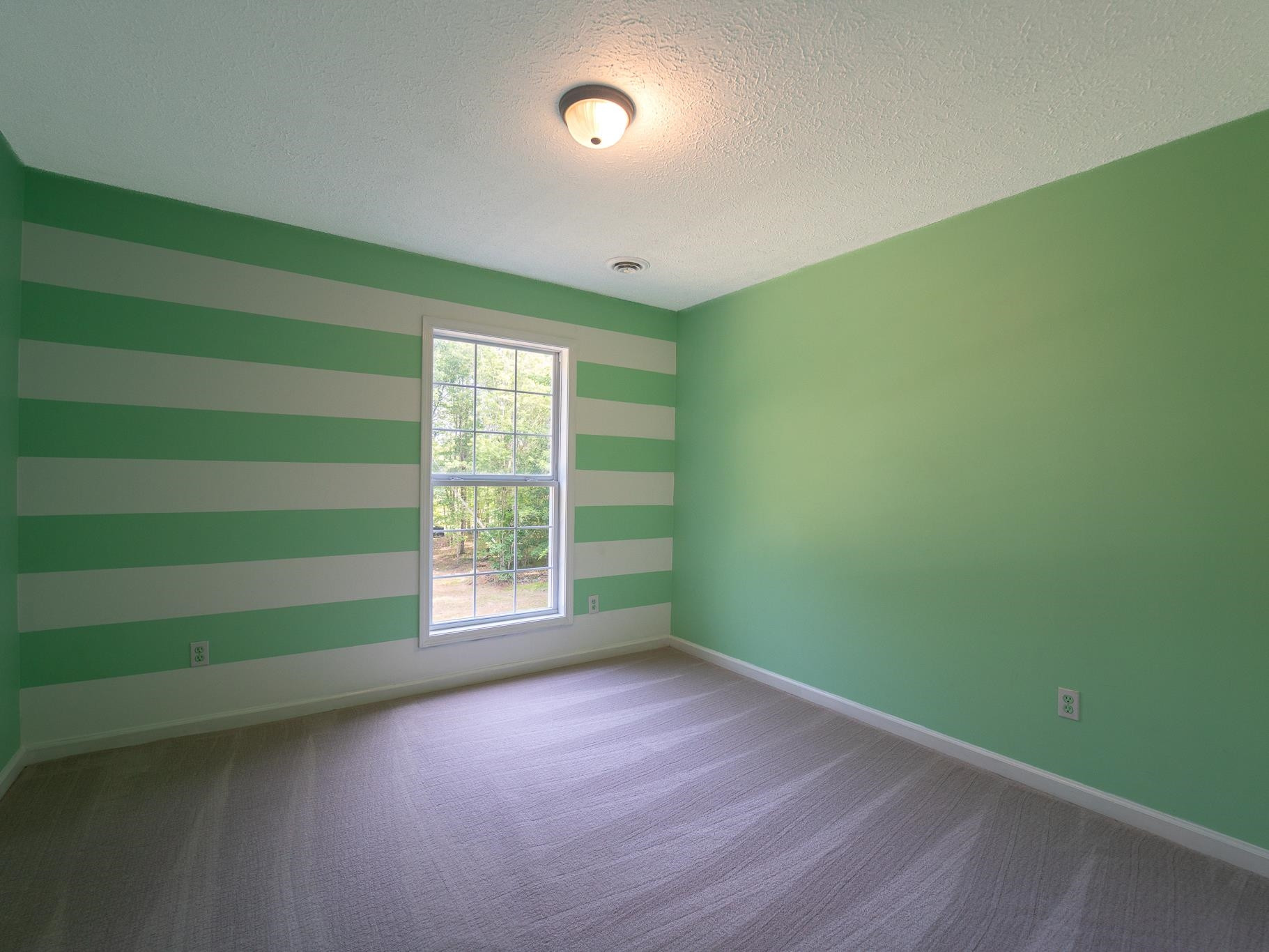 9961 Old Middlesex Road Middlesex, NC 27557 - Photo 23 of 30 a view of empty room with window and stairs