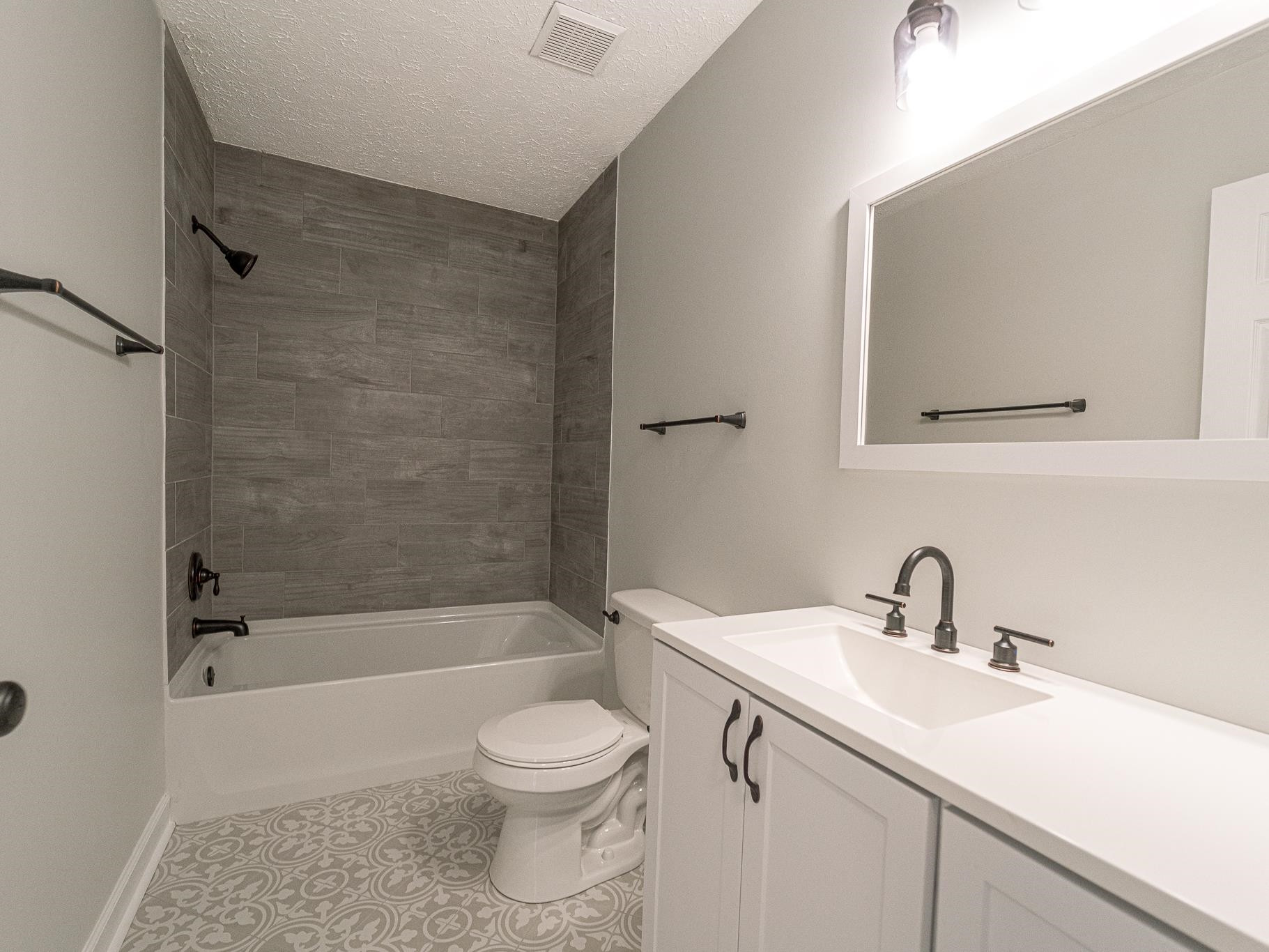 9961 Old Middlesex Road Middlesex, NC 27557 - Photo 28 of 30 a bathroom with a sink toilet and shower
