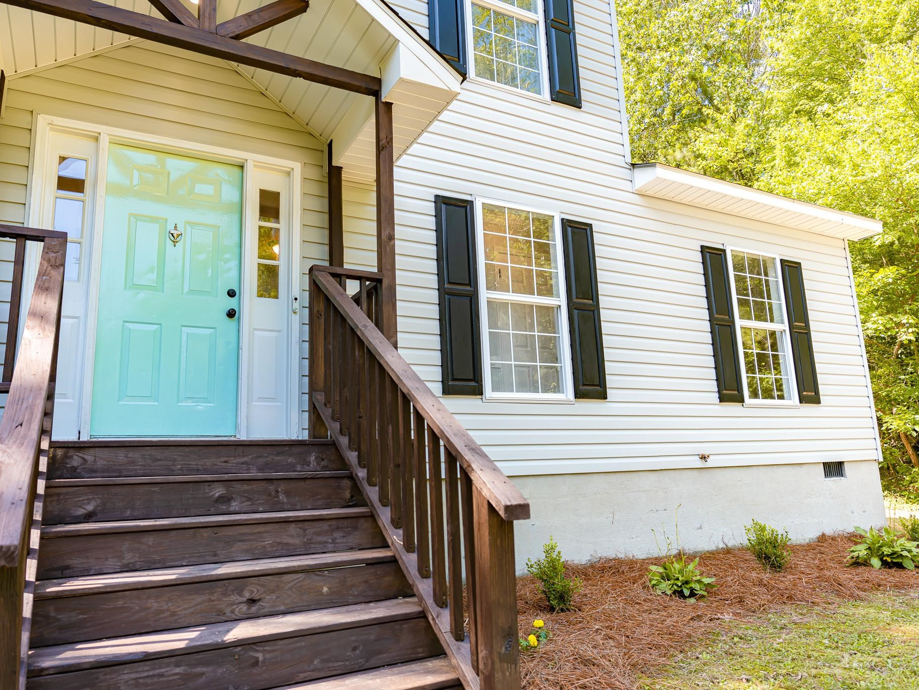 9961 Old Middlesex Road Middlesex, NC 27557 - Photo 3 of 30 a view of a house with backyard and deck