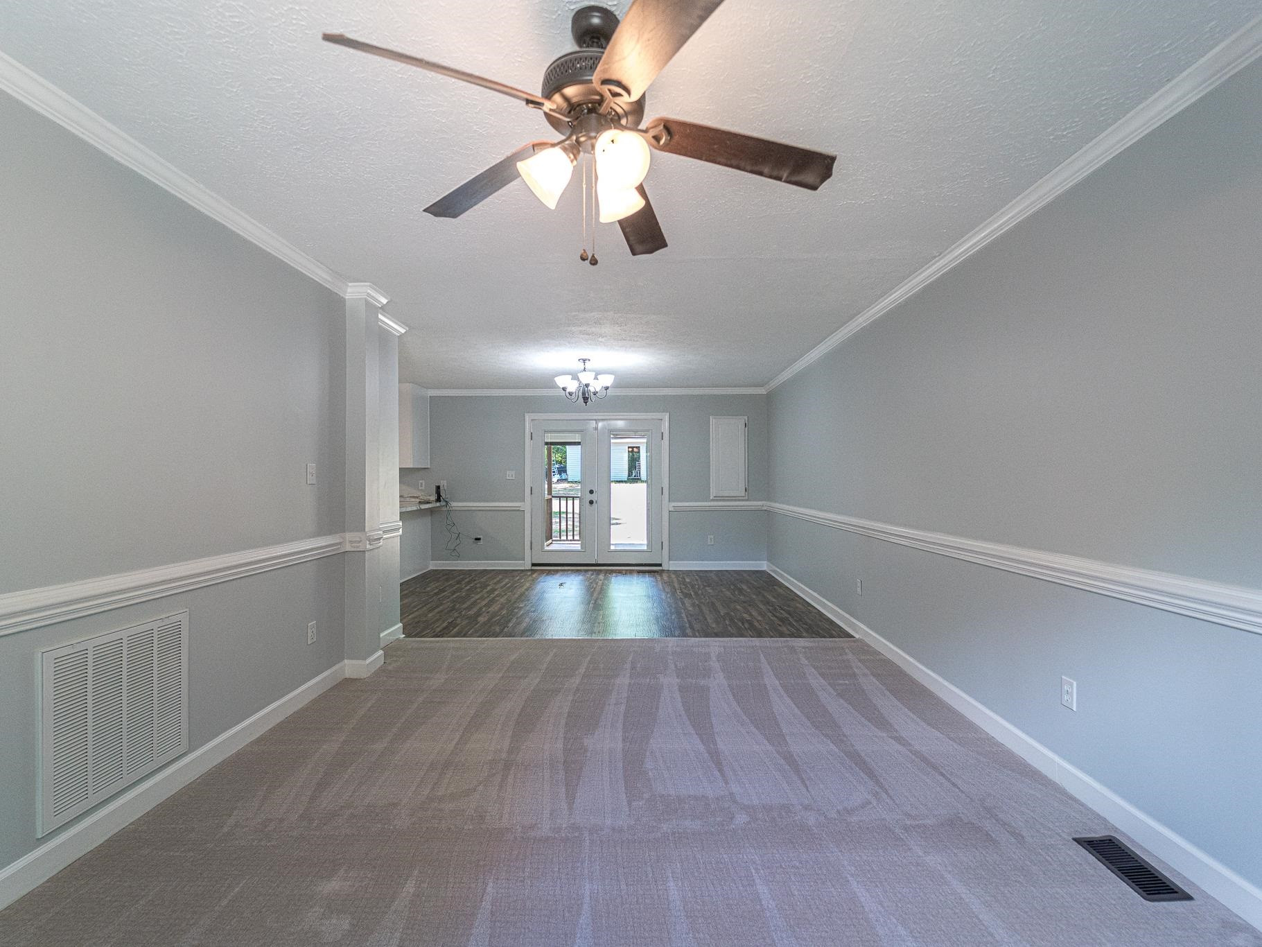 9961 Old Middlesex Road Middlesex, NC 27557 - Photo 5 of 30 wooden floor in an empty room with a window