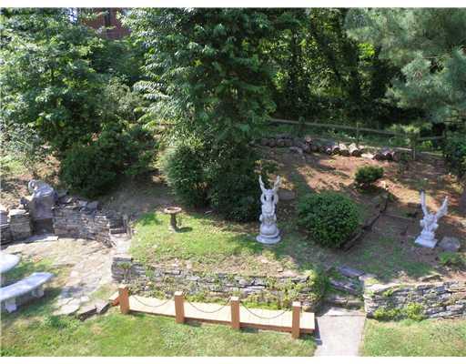 1111 Rostraver Street Monessen, PA 15062 - Photo 15 of 18 Yard/Garden. An enchanting landscaped garden is the focal point of the view from your deck or balcony.