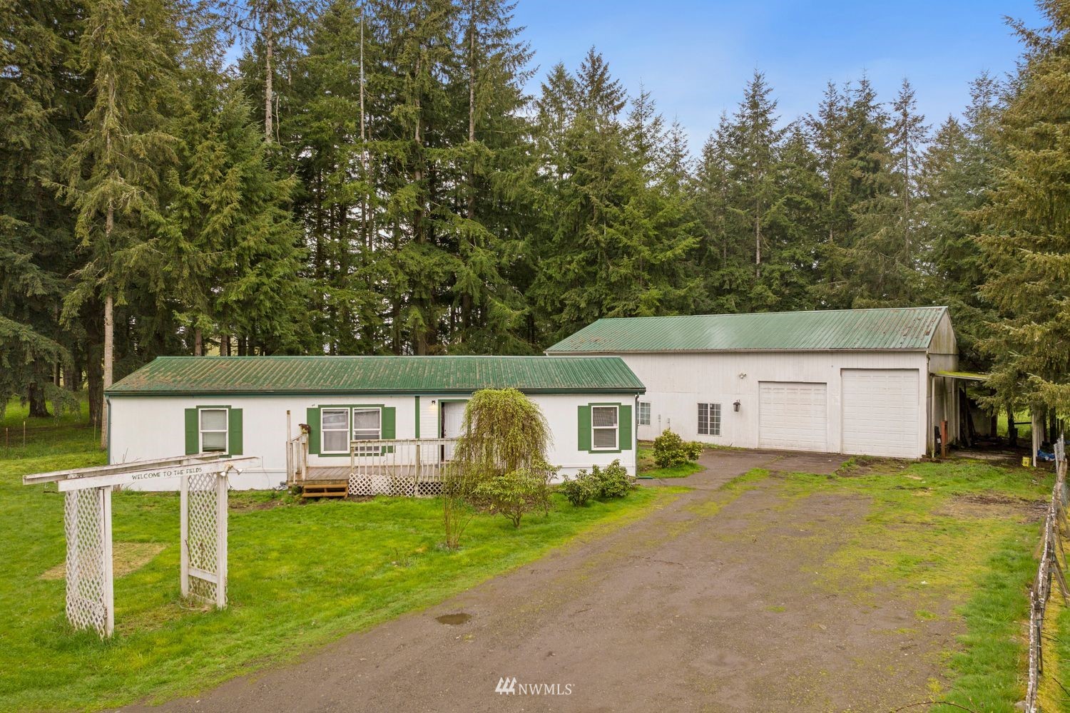6323 190th Lane Southwest Rochester, WA 98579 - Photo 2 of 17 a view of house with outdoor space and sitting area