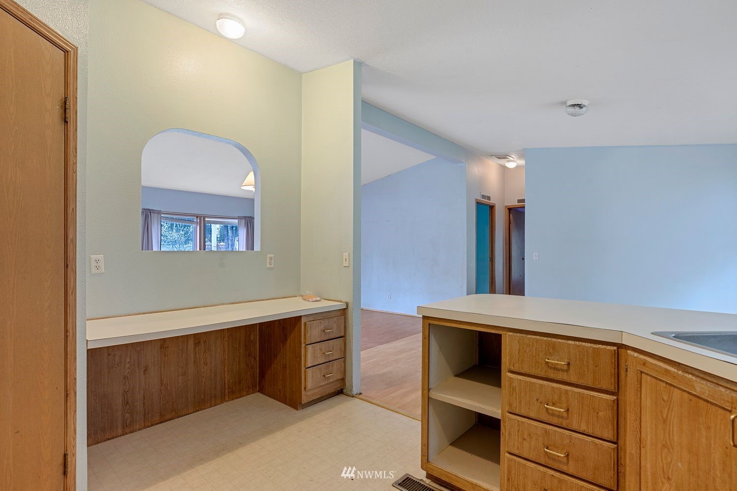 6323 190th Lane Southwest Rochester, WA 98579 - Photo 7 of 17 a view of cabinets with wooden floor and cabinet