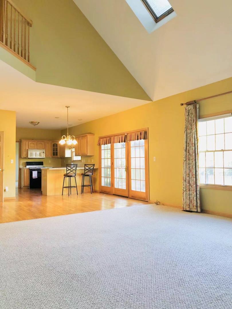 1381 Axcel Lane Sycamore, IL 60178 - Photo 12 of 39 a view of an empty room with a window
