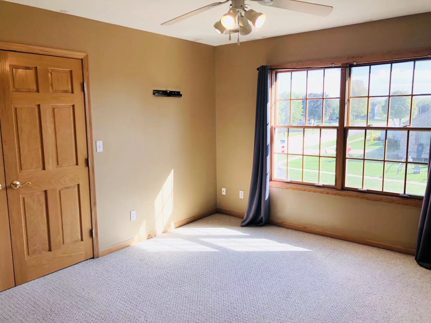 1381 Axcel Lane Sycamore, IL 60178 - Photo 18 of 39 an empty room with windows