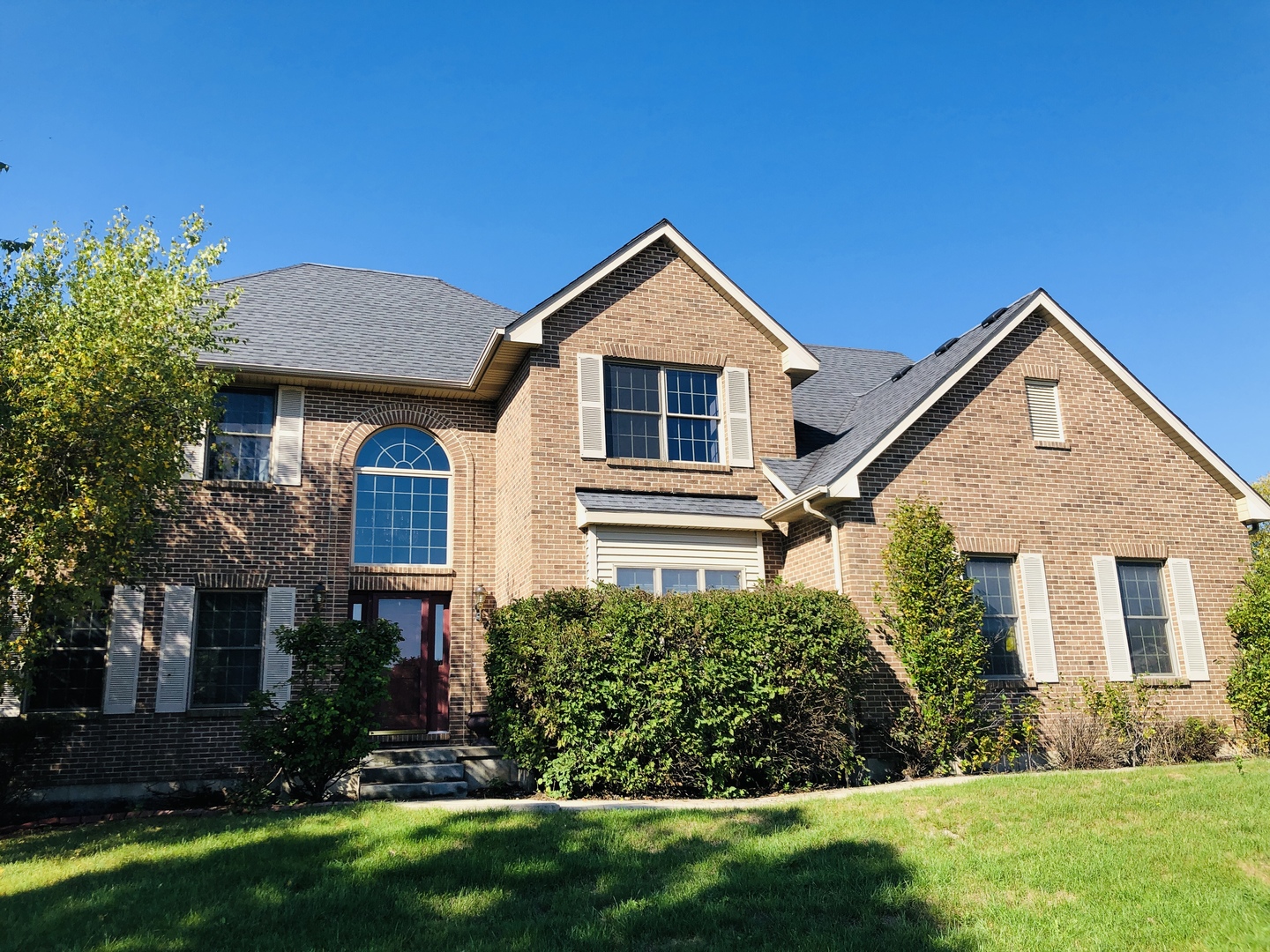 1381 Axcel Lane Sycamore, IL 60178 - Photo 2 of 39 front view of house with a yard