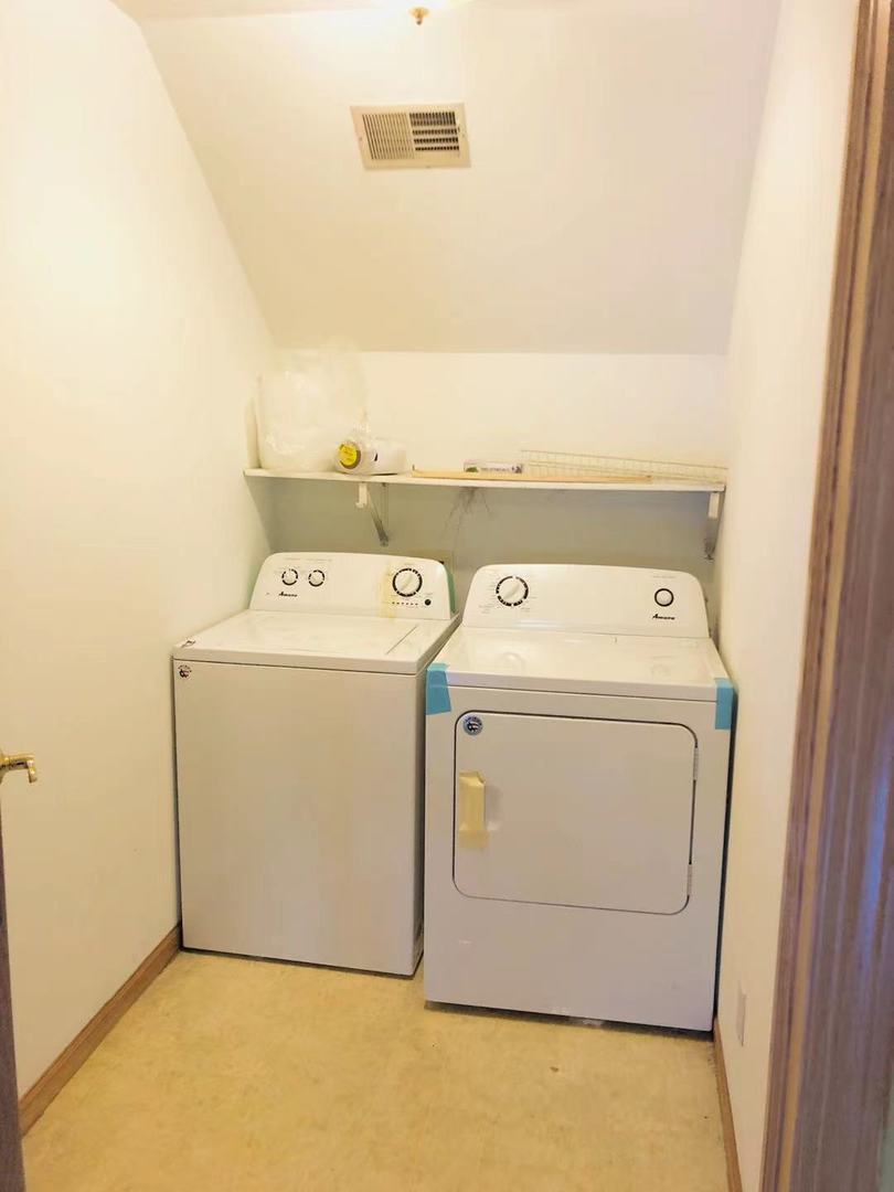 1381 Axcel Lane Sycamore, IL 60178 - Photo 25 of 39 a utility room with dryer and washer