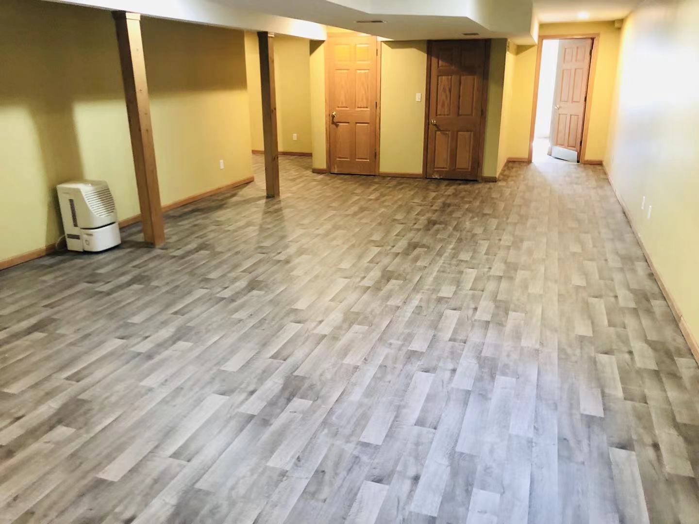 1381 Axcel Lane Sycamore, IL 60178 - Photo 29 of 39 a view of an empty room with wooden floor and a window