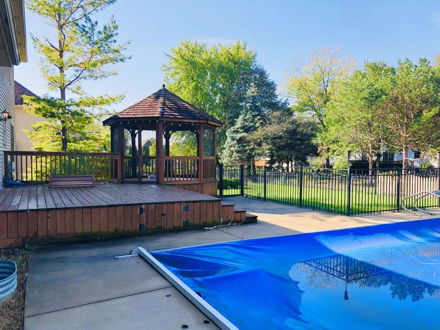 1381 Axcel Lane Sycamore, IL 60178 - Photo 33 of 39 a view of a backyard with wooden fence
