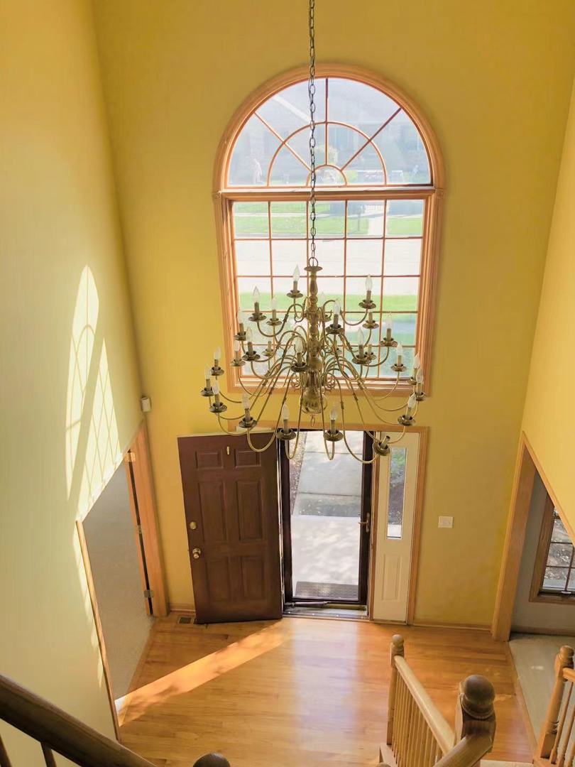 1381 Axcel Lane Sycamore, IL 60178 - Photo 7 of 39 a view of a porch with a refrigerator