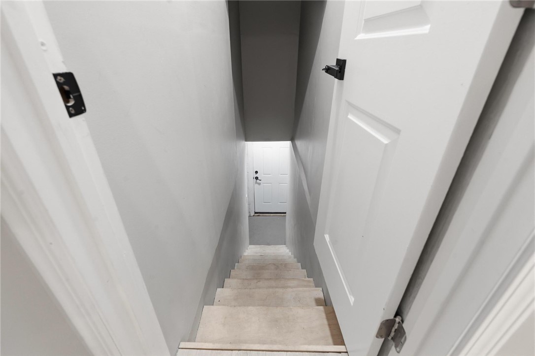 2950 Fairfield Pike Springfield, OH 45502 - Photo 32 of 48 Navigate to another level with ease via these well-crafted interior stairs.